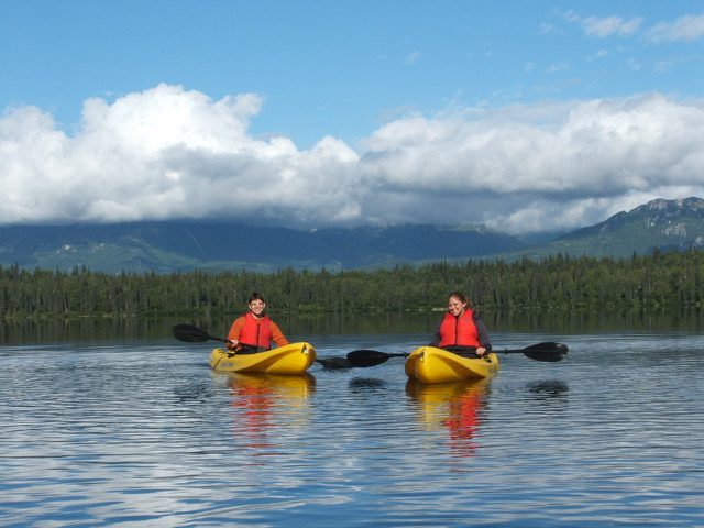 2 kayakers 2 kayakers enjoying a tour on Byer's Lake in Denali state park